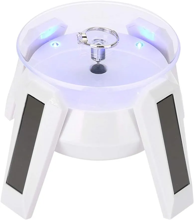 aqxreight Solar 360 Degrees Rotating Turntable Watch Phone Jewelry Display Stand LED Light clockwise. the. onoff. Light. be. can. turn. Display. rotate. counterclockwise.. can. (White)