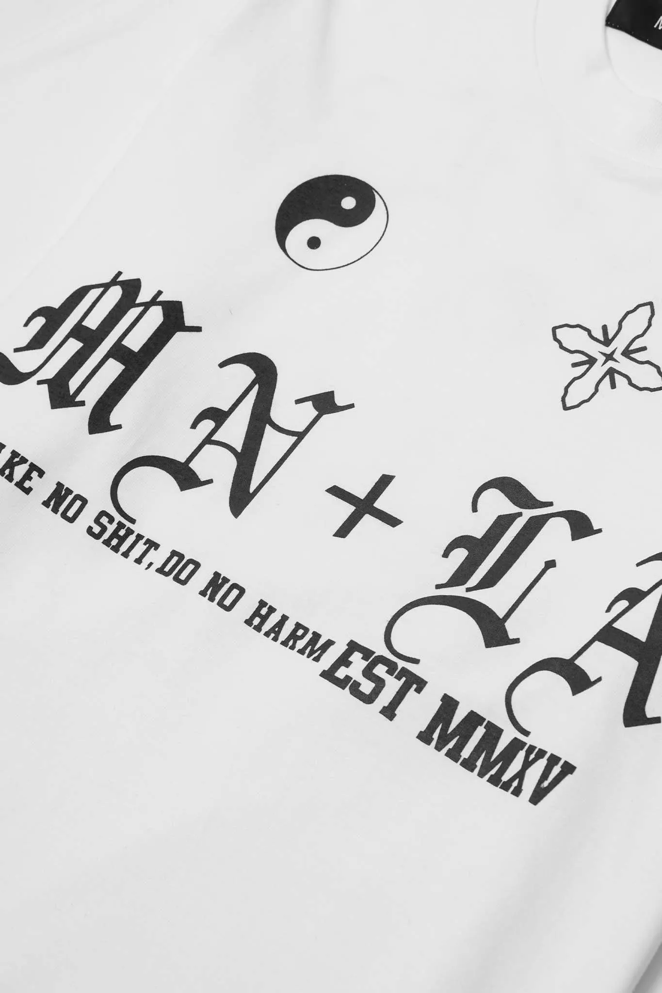 "TAKE NO SHIT, DO NO HARM" TEE IN WHITE